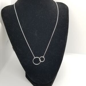 delicate sterling silver chain necklace with two hoops